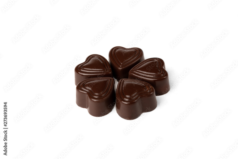 Chocolate sweets in heart shape isolated on white background. Chocolate sweets in heart shape isolated on white background.