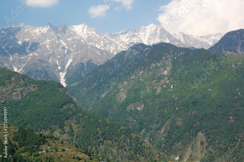 A beautiful view of the Dhauladhar Himalayan Range on a clear day at Kareri, Himachal Pradesh, India © kdreams02