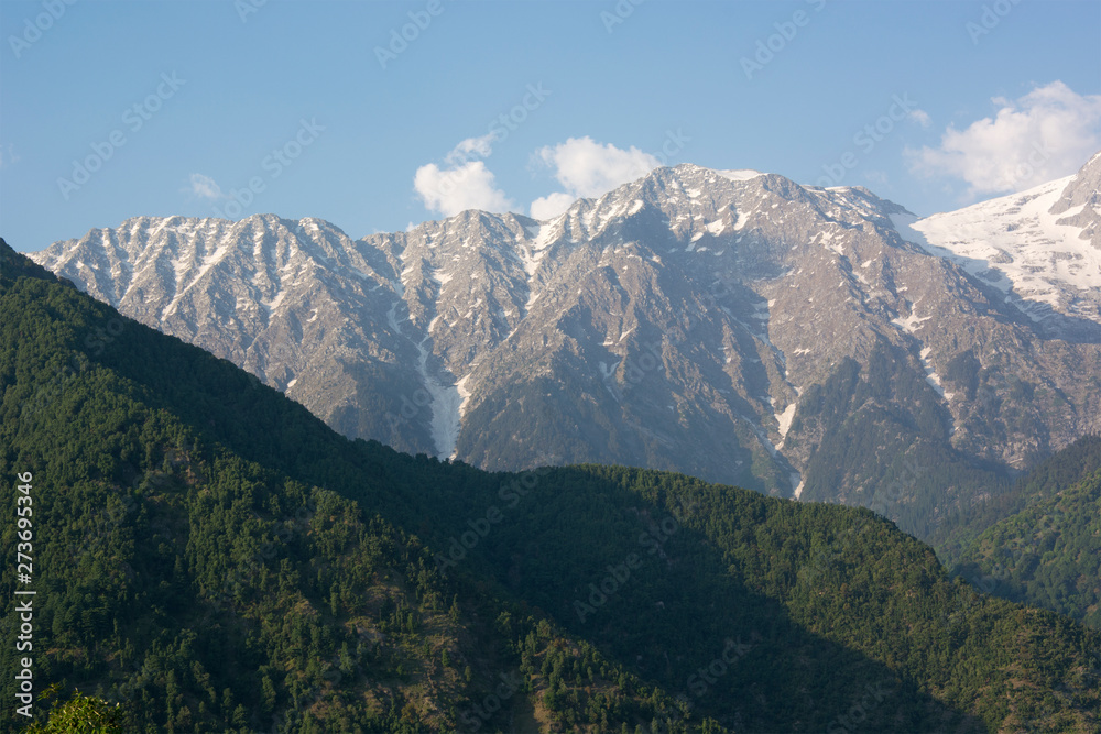 A beautiful view of the Dhauladhar Himalayan Range on a clear day at Kareri, Himachal Pradesh, India