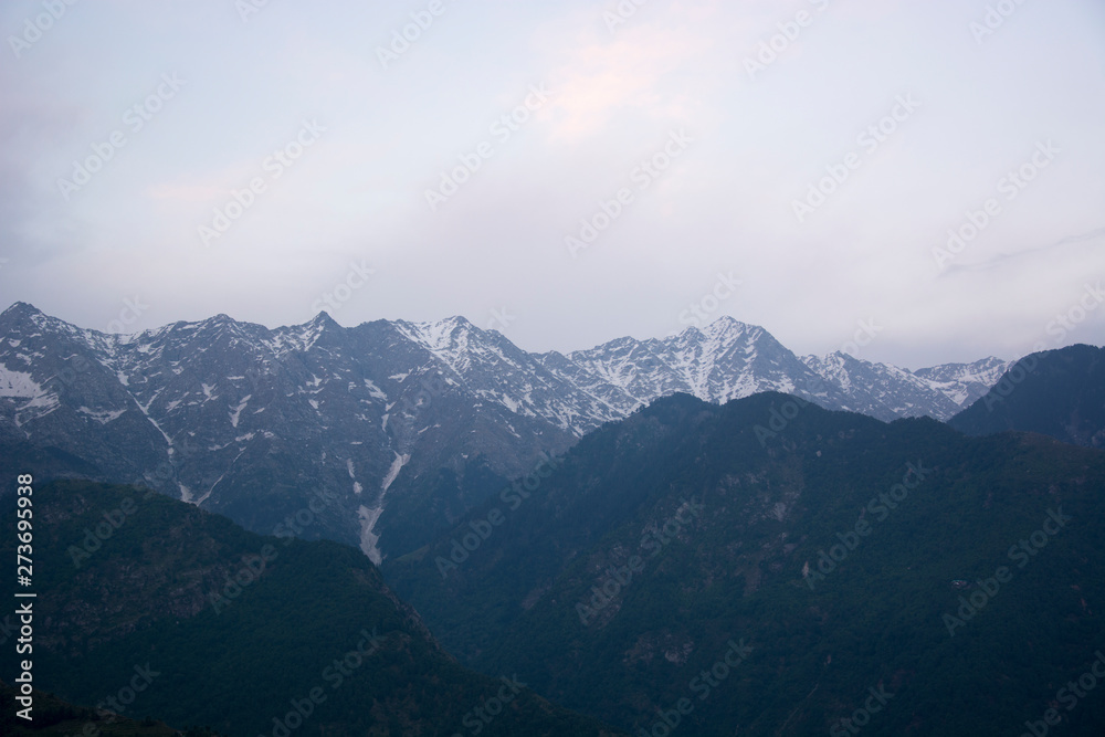 A beautiful view of the Dhauladhar Himalayan Range at Sunset at Kareri, Himachal Pradesh, India A beautiful view of the Dhauladhar Himalayan Range at Sunset at Kareri, Himachal Pradesh, India