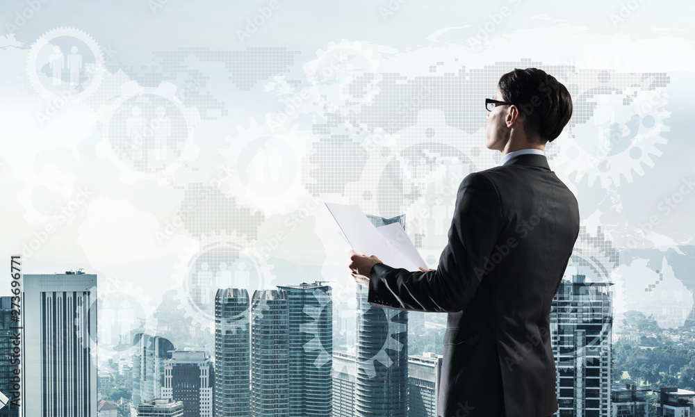 Concept of business success and control with confident boss against cityscape background Concept of business success and control with confident boss against cityscape background