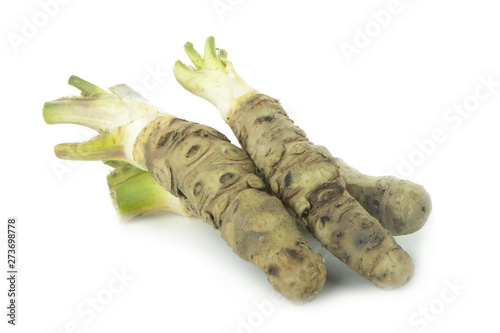 heap of wasabi roots isolated on white background