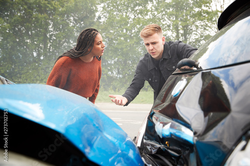 Slika na platnu Two Angry Motorists Arguing Over Responsibility For Car Accident