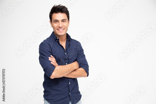 Portrait of Caucasian man with arms crossed and smile isolated over white background, Looking at camera, Happy feeling concept