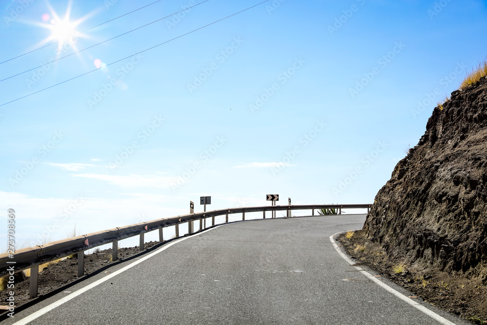 Summer background of road and sea landscape 