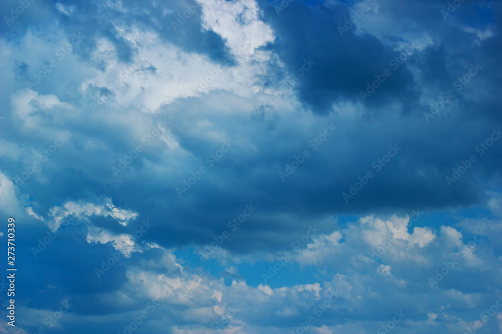 Blue colored stormy clouds sky