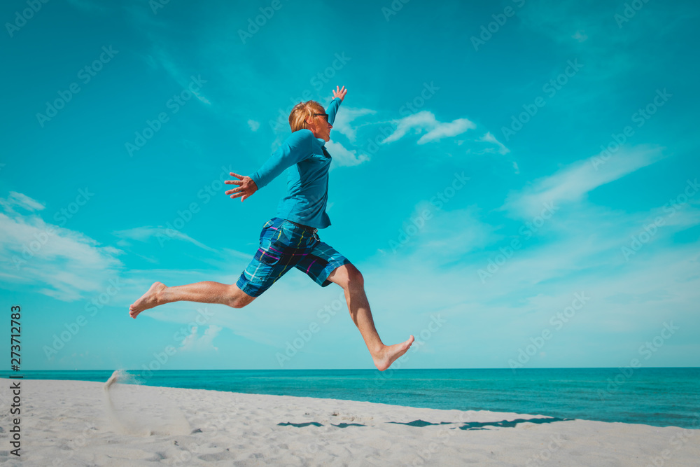 happy young man on beach vacation, enjoy sea