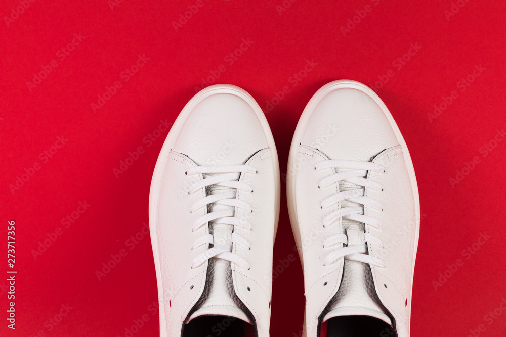 Men's shoes. White sneaker on background .