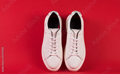 Men's shoes. White sneaker on background .