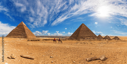 Bedouins near the Pyramids of Giza  sunny day panorama