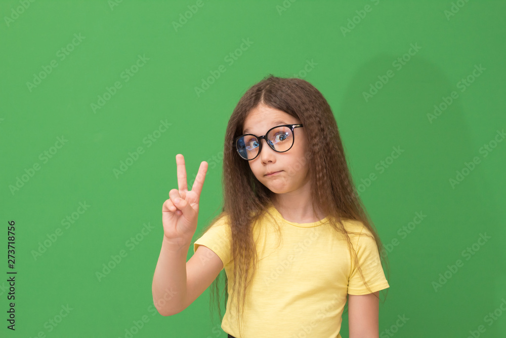child showed two fingers child showed two fingers