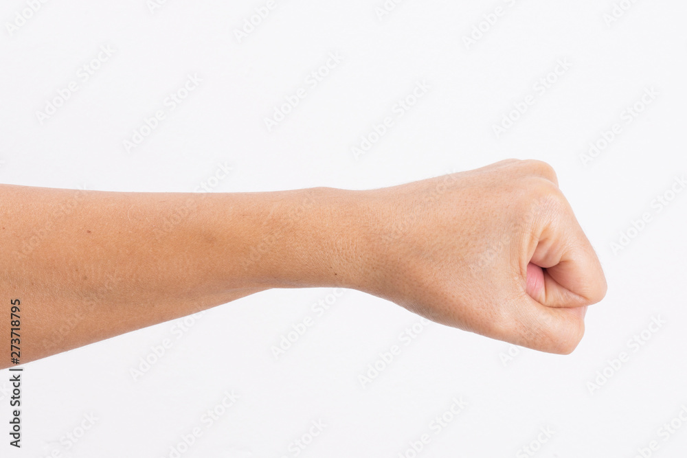 Close-up of a woman's hand and finger on white background