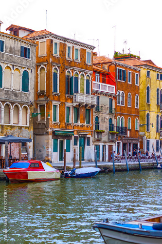 Canal with gondola in Venice, Italy. Architecture and landmarks of Venice. Venice postcard with gondolas photo