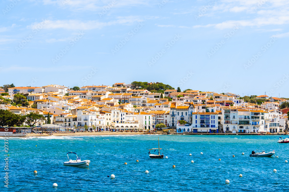 White houses and blue sea in Cadaques port, Costa Brava, Spain