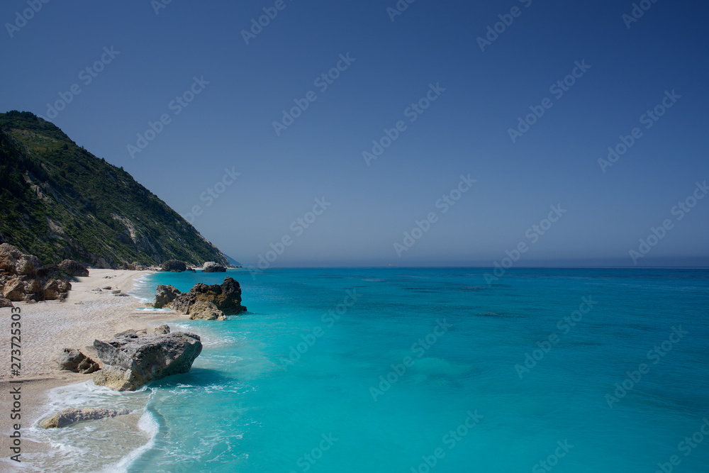 Tropical beach with rock in Greece Lefkada Lefkas 