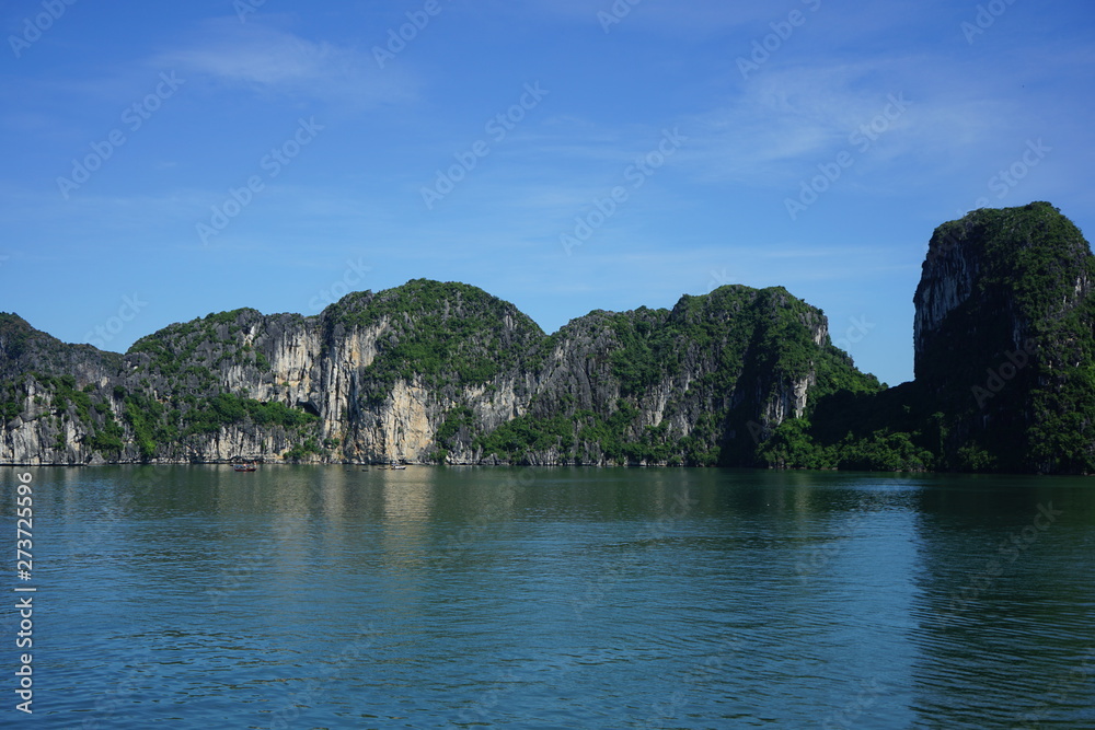 VIETNAM HANOI Halong Bay 2019 YEAR, Beautiful scenic view on a foggy cloudy day of the cruises in Halong Bay. It is a beautiful natural wonder in northern Vietnam near the Chinese border, on VIETNAM HANOI Halong Bay 2019 YEAR, Beautiful scenic view on a foggy cloudy day of the cruises in Halong Bay. It is a beautiful natural wonder in northern Vietnam near the Chinese border, on