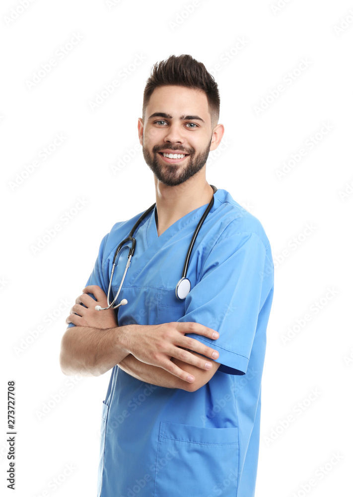 Young male doctor in uniform isolated on white Young male doctor in uniform isolated on white