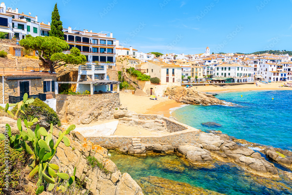 Amazing beach in Calella de Palafrugell, scenic fishing village with white houses and sandy beach with clear blue water, Costa Brava, Catalonia, Spain