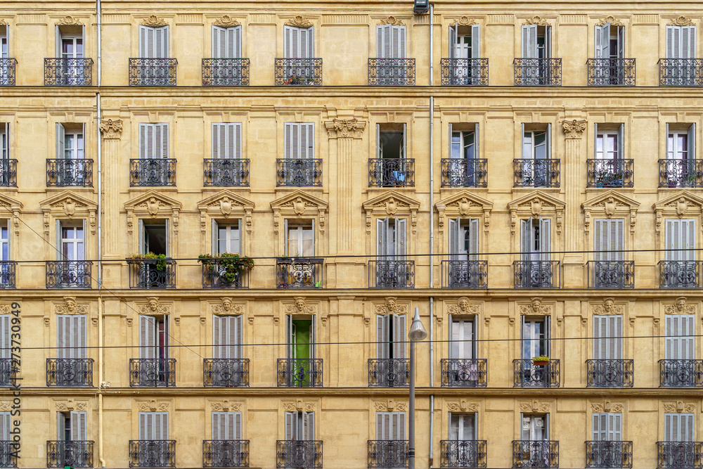 Traditional French Haussmann architecture and residential building in Marseille, France. Traditional French Haussmann architecture and residential building in Marseille, France.