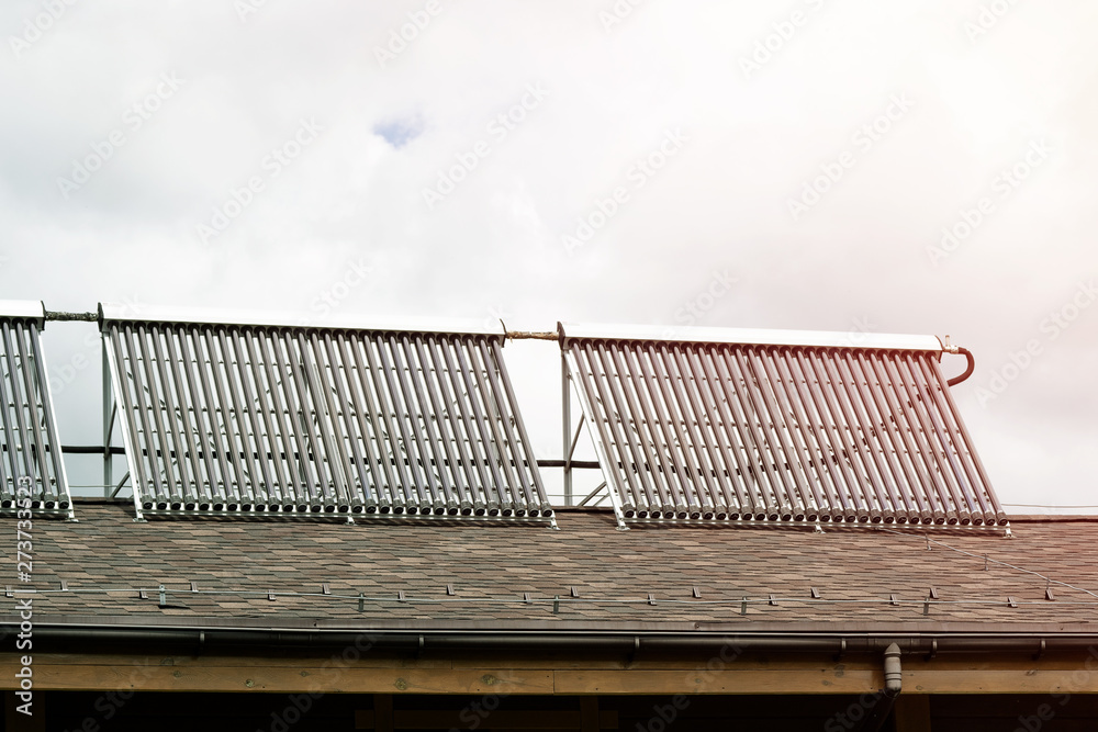 Solar water heater on roof top, beautiful blue sky background. Stock ...