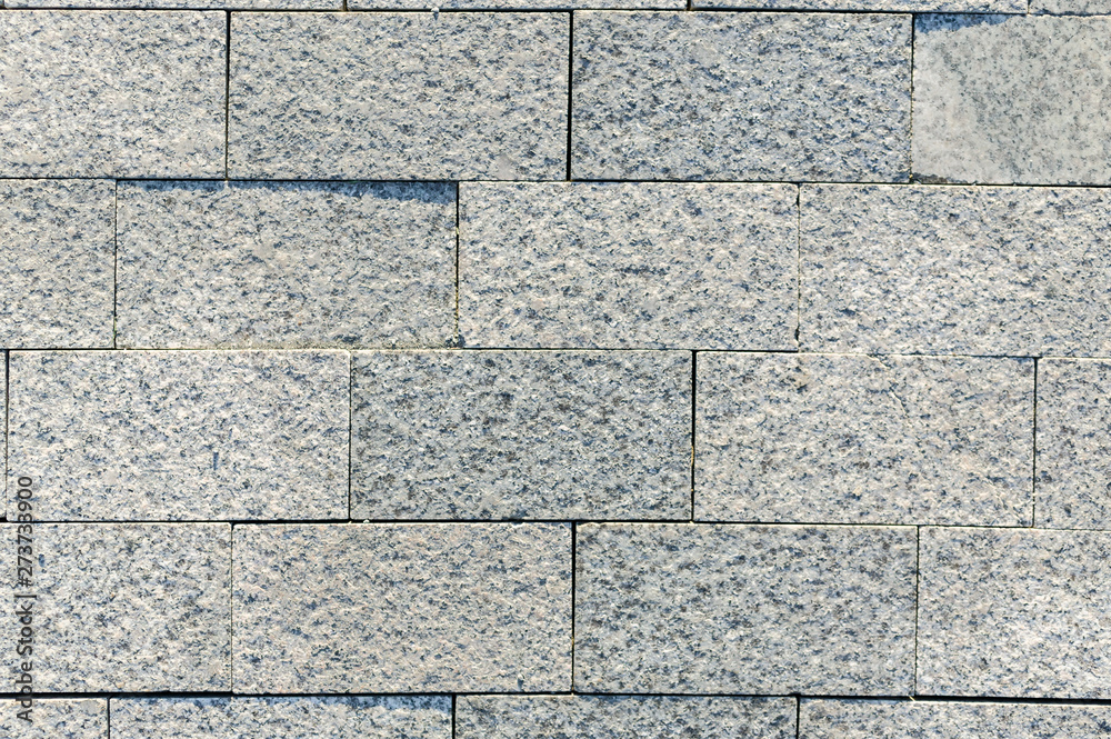 Obraz premium Rectangular tile from a natural polished stone texture.