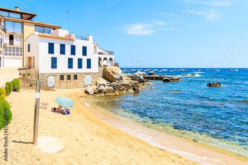 Traditional white houses on beach in port Bo of Calella de Palafrugell, Costa Brava, Catalonia, Spain