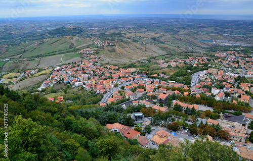 View from the top of San Marino castle towards the sea and over the San Marino villages and Rimini, Italy