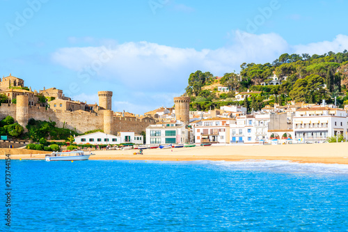 Fototapeta Naklejka Na Ścianę i Meble -  Blue azure sea and beach view in Tossa de Mar, Costa Brava, Spain
