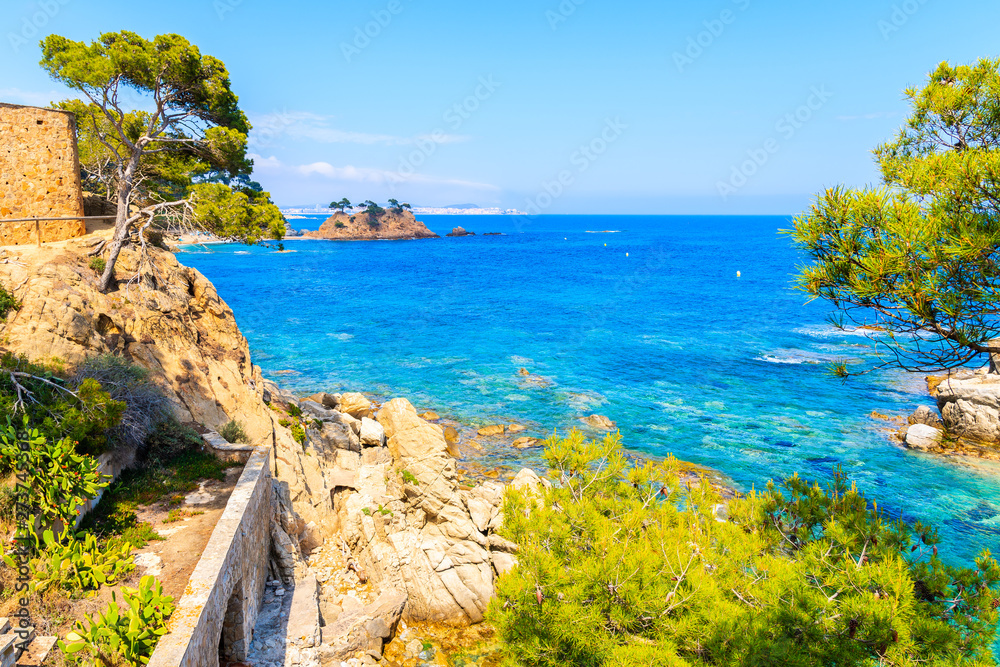 Coastal path along blue sea near Cap Roig, Costa Brava, Spain