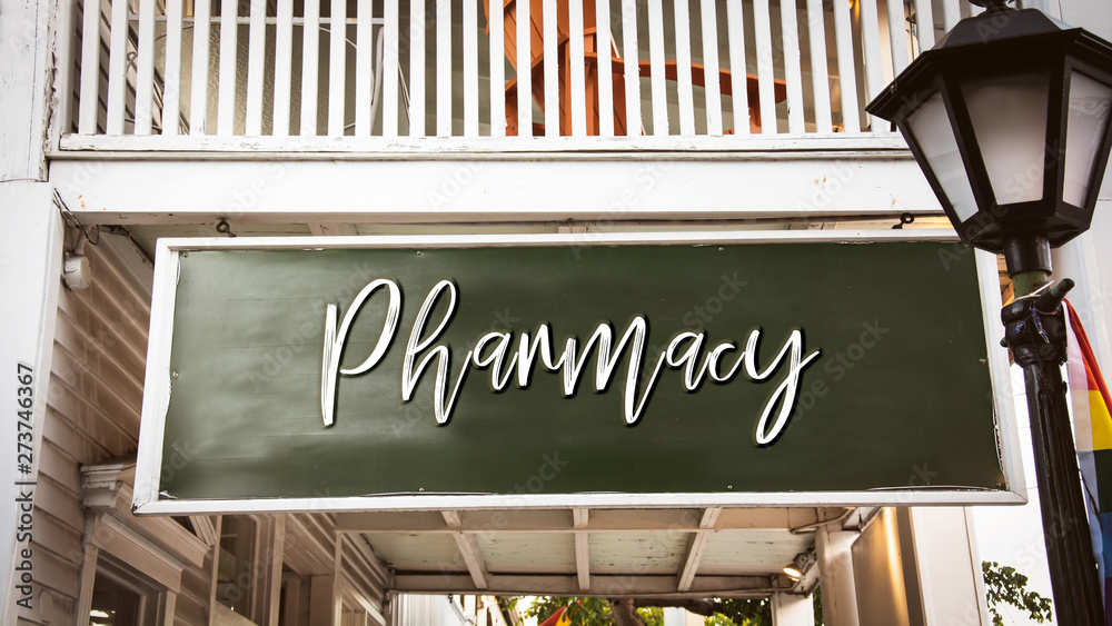 Obraz premium Street Sign to Pharmacy
