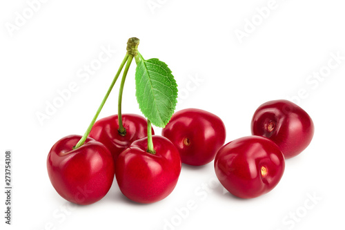 Sweet red cherries with leaves isolated on white background macro