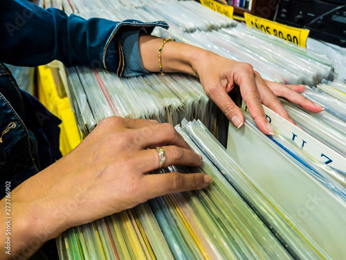Woman looking for vinyl records
