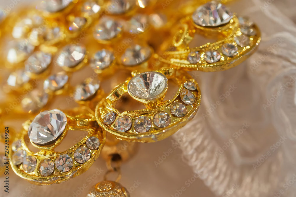 Close-up view diamond golden pendant Close-up view diamond golden pendant