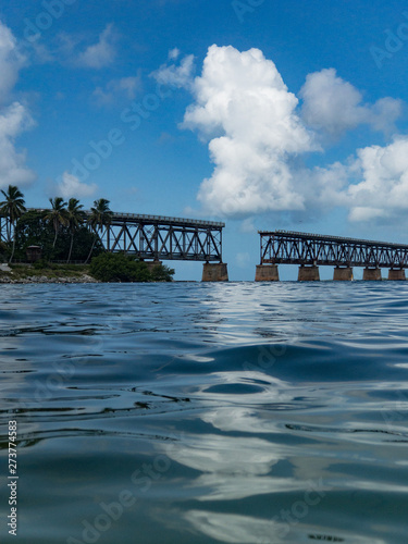 Ocean view of the old Flagler Railroad bridge spanning across Bahia Honda from the water