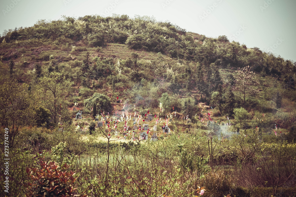 Chinese tombstones on the hill.  It’s one of traditional in China.