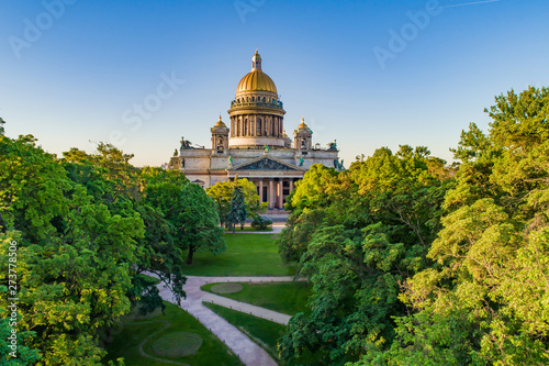 Saint-Petersburg. Russia. City panorama of St. Petersburg. Isaakievsky cathedral view across the green park. Petersburg cultural monuments. Architecture of St. Petersburg. Russian landmarks.