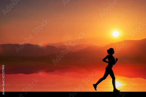 Fototapeta Naklejka Na Ścianę i Meble -  Silhouete of people running exercise in the evening