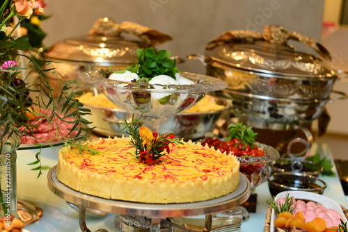 Φωτογραφία pie savory, silver chaff served at the buffet, buffet table setting, party table