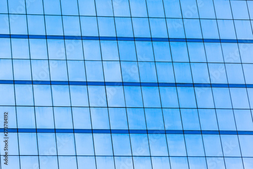 Blue glass windows of office building