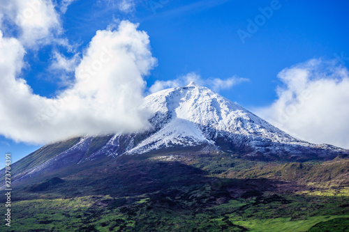 Mount Pico volcano summit with snow.