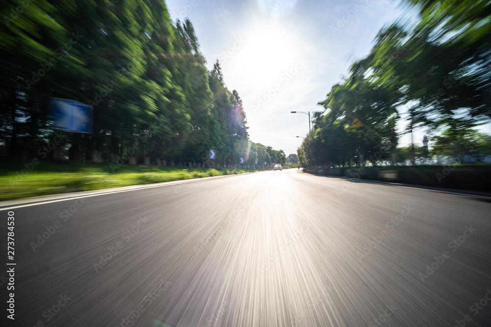 Fototapeta high speed view of asphalt road