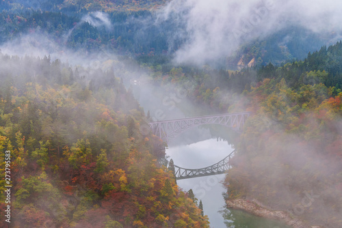 First bridge and Tadami river in beautiful autumn season 