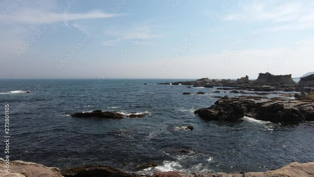 Looking at the rocky shore