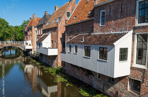 The famous 'hanging kitchens' over the Damsterdiep in the old town of Appingedam, Groningen, Holland.