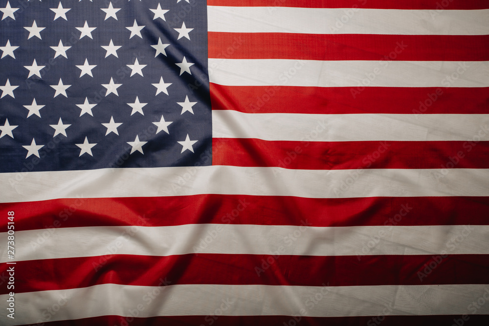 Naklejka premium United States of America flag. Image of the american flag flying in the wind.