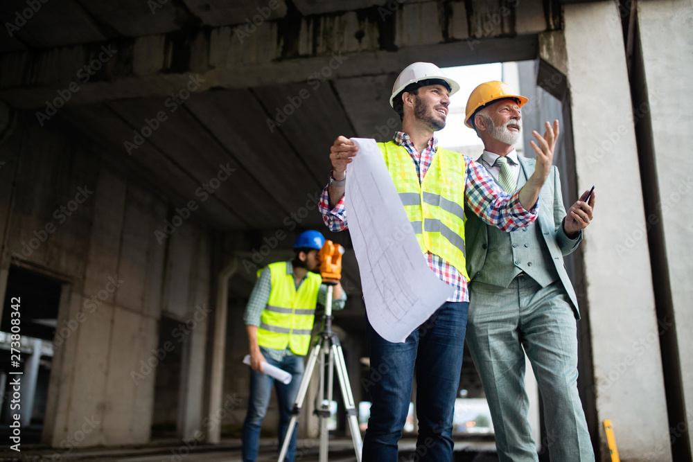 custom made wallpaper toronto digitalEngineer, foreman and worker discussing in building construction site