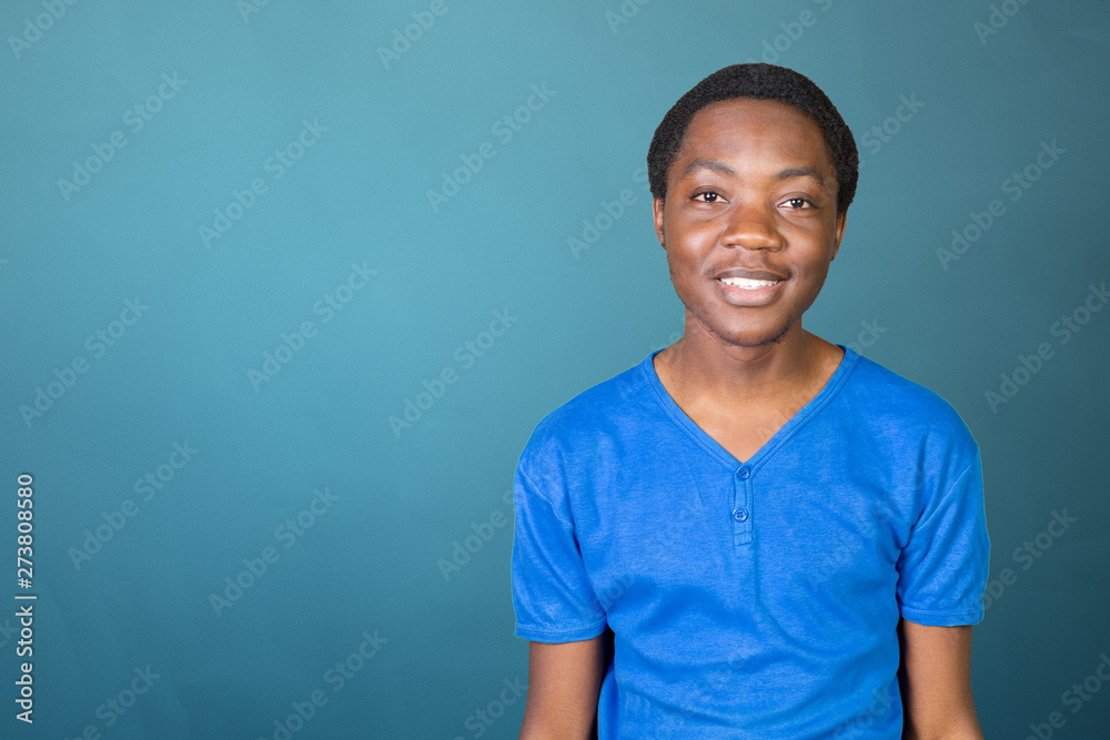 Portrait of happy young african guy with his arms crossed Portrait of happy young african guy with his arms crossed