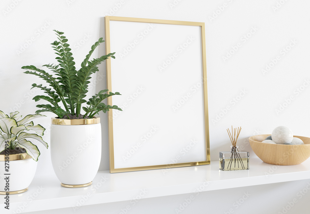 Fototapeta Złota rama oparta na białej półce we wnętrzu z roślinami i dekoracjami makieta renderowania 3D
