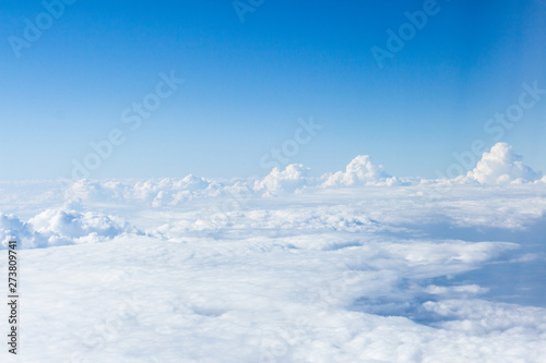 Clouds and sky from airplane window view © fotofabrika