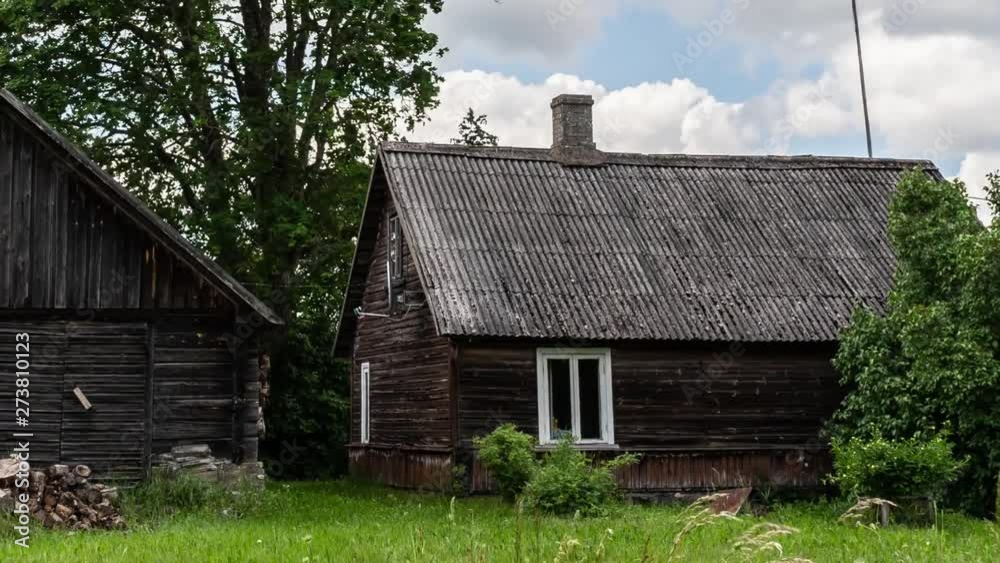 Timelapse of old building in a small village, countryside. Summer time. Timelapse of old building in a small village, countryside. Summer time.